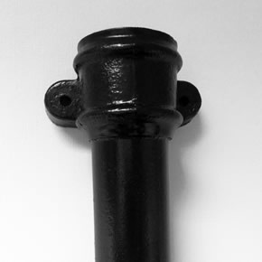 Integral eared socket for cast iron pipes