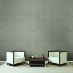 Modern interior with two armchairs near empty brown wall.