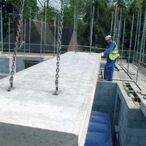 Pre-fabricated flooring being installed at a construction site