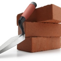 A trowel sitting atop a pile of bricks.Please see some similar pictures from my portfolio: