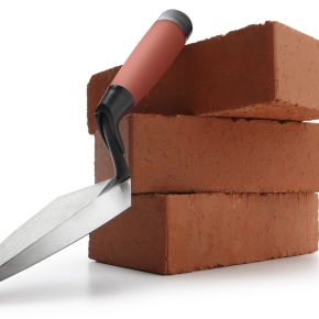 A trowel sitting atop a pile of bricks.Please see some similar pictures from my portfolio: