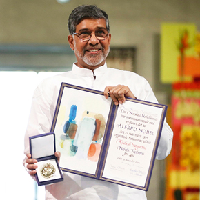 Nobel Peace Prize laureate Kailash Satyarthi poses with his medal during the Nobel Peace Prize awards ceremony