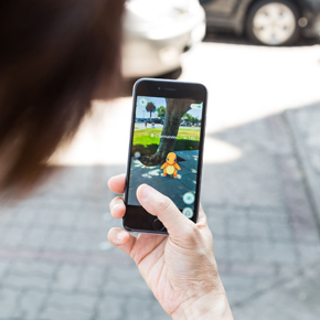 An ios user plays pokemon go, a free-to-play augmented reality mobile game developed by niantic for ios and android devices.