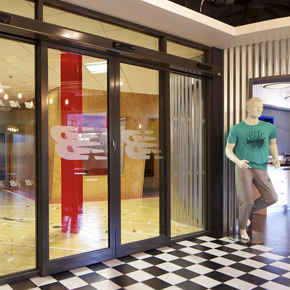 GEZE bi-parting automatic doors at the New Balance HQ